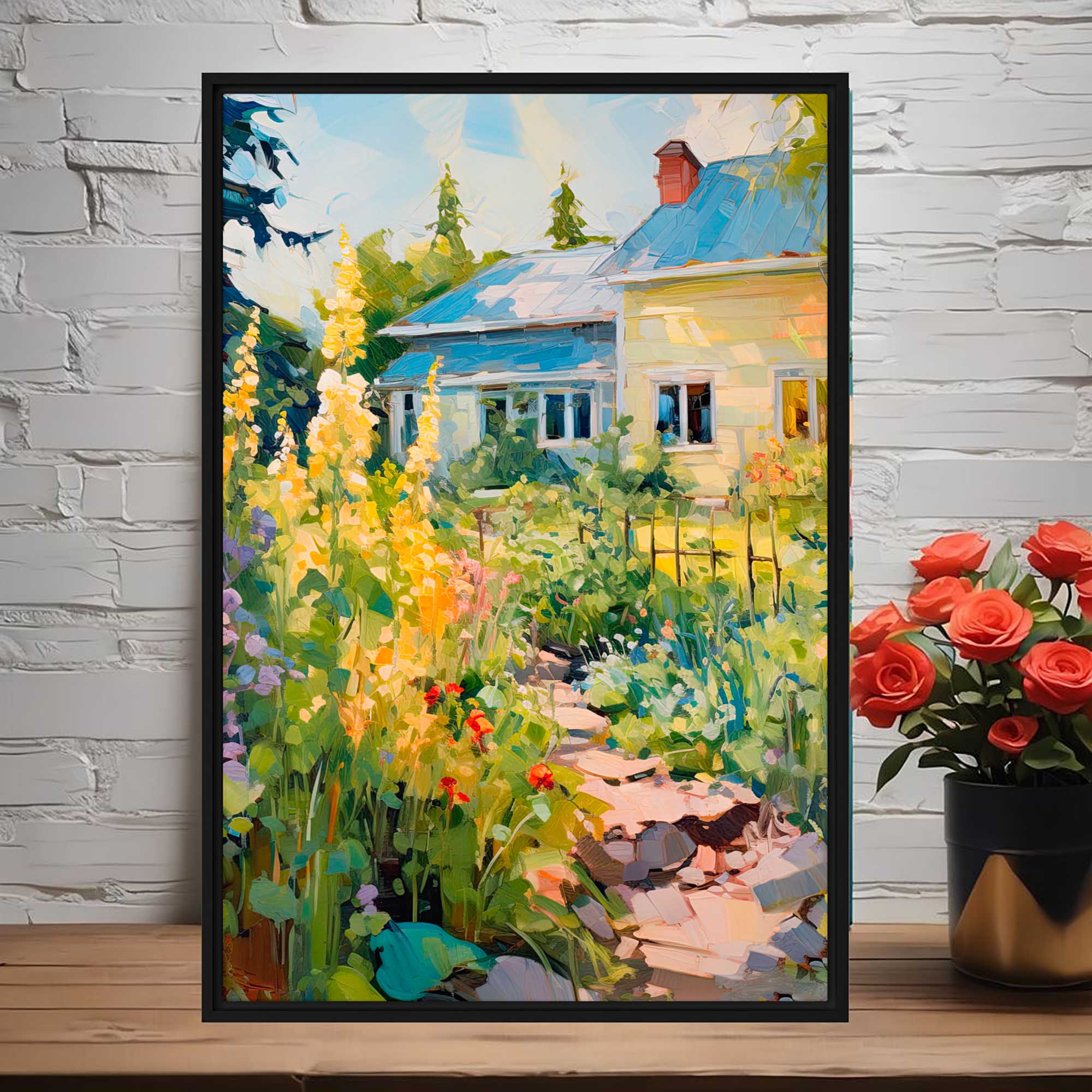 Framed painting of a garden scene with a house in the background, displayed on a white brick wall.