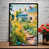Framed painting of a garden scene with a house in the background, displayed on a white brick wall.