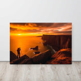 Canvas print of a sunset over a cliff with a person and tripod.