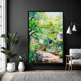 Garden Serenity– Art Fusion Framed Canvas Framed painting of a garden scene on a black wall with decor elements.