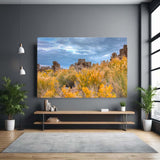 Large canvas print of a natural landscape in a modern living room.